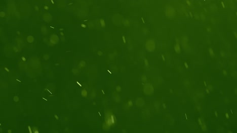 Weiße-Wirbelnde-Partikel-Vor-Grünem-Hintergrund