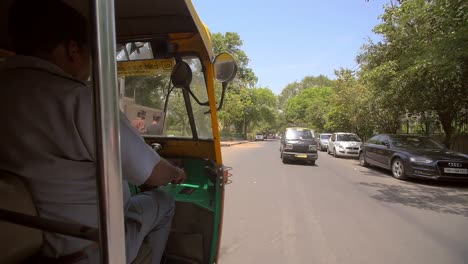 Indian-Tuk-Tuk-Driving-Along-Side-Road
