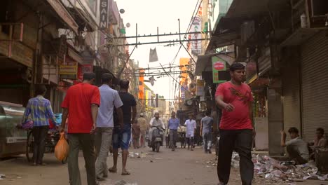 People-Walking-Down-a-Road-in-India