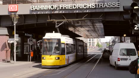 Tram-Passing-Under-Bridge-in-Berlin