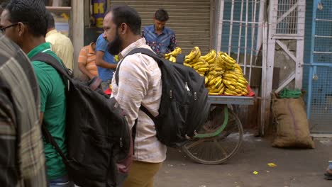 Handheld-Shot-of-a-Vendor-Selling-Bananas