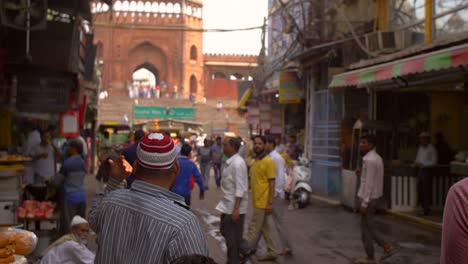 Man-Beckoning-on-Crowded-Indian-Street