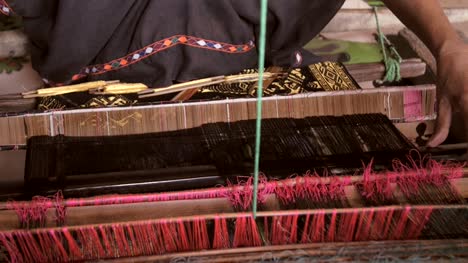 Woman-Removing-and-Inserting-Weaving-Sword