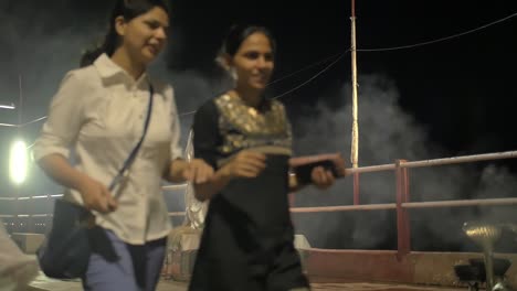 Men-Performing-Nighttime-Ganga-Aarti-Ceremony