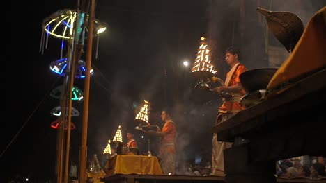 Indian-Men-Hold-Ceremonial-Candelabras