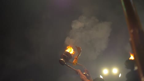 Man-Lifts-Up-Ceremonial-Fire-Bowl