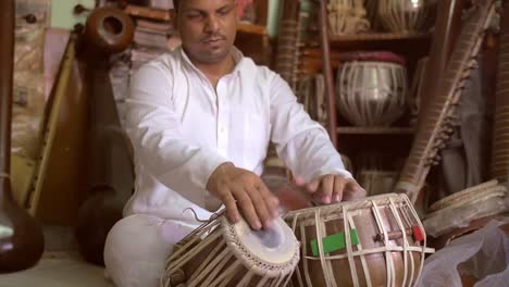 Cross-Legged-Man-Playing-Tabla