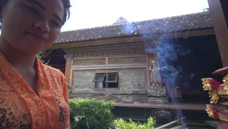 Woman-Burning-Incense-in-a-Hindu-Temple