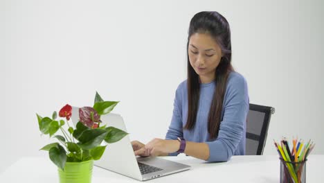 Young-Lady-Checking-Fitbit