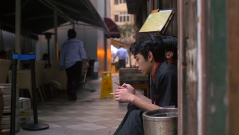 Man-on-Smartphone-and-Smoking