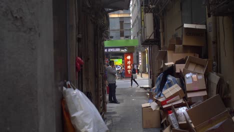 Man-Making-Phone-Call-in-Alleyway