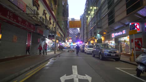 Auto-Und-Radfahrer-In-Hongkong