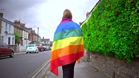 Walking-Down-Street-with-Pride-Flag