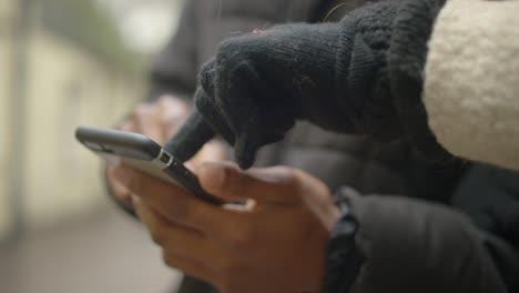 Couples-Hands-Using-Smartphone