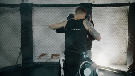 Tracking-Past-Training-in-MMA-Cage