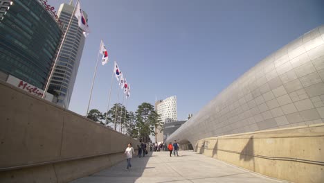 People-Walking-by-the-DDP-in-Seoul