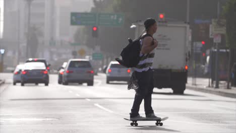 Man-Skateboarding-In-Downtown-LA
