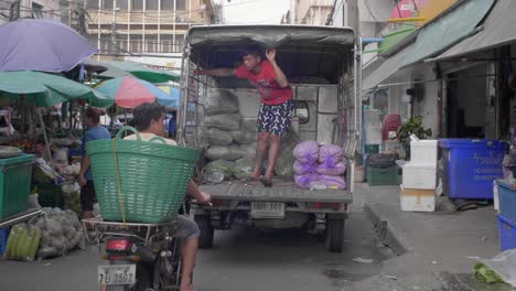 Man-Standing-in-Produce-Truck