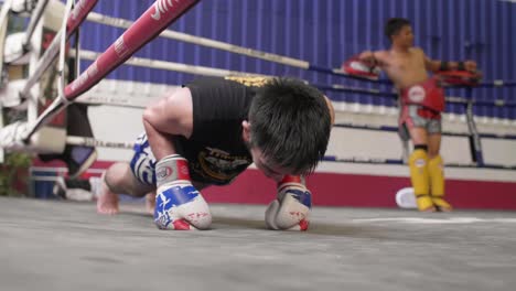 Muay-Thai-Boxer-Doing-Push-Ups