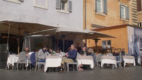 People-Sat-Outside-Cafe