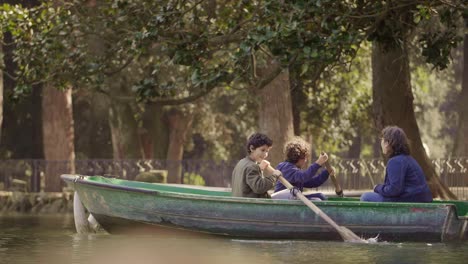 Youths-Rowing-A-Boat