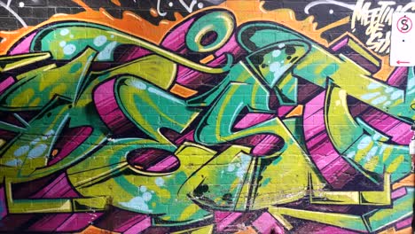 Graffiti-Auf-Backsteinmauer-Handaufnahme