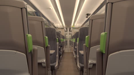 Looking-down-aisle-of-quiet-train