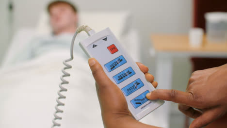 CU-Nurse-Uses-Hospital-Bed-Remote-Control