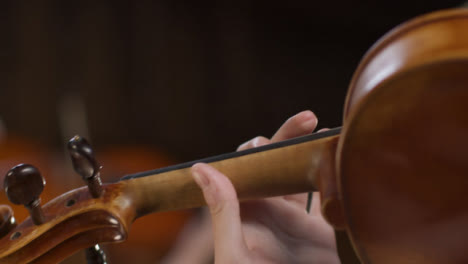 Close-Up-Female-Violinist-Playing-Violin