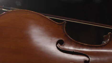 Panning-Shot-of-Cello-With-Bow