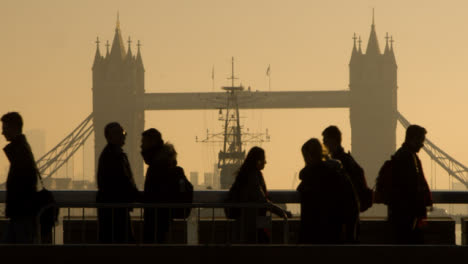 Pedestrians-In-Front-Of-Tower-Bridge