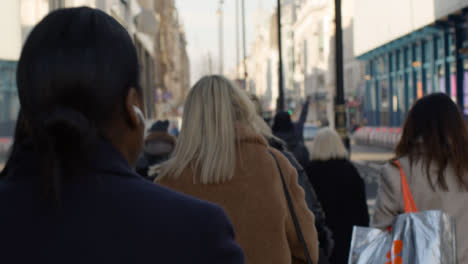 Pedestrians-Walking-In-Busy-Central-London-Street,-Daytime