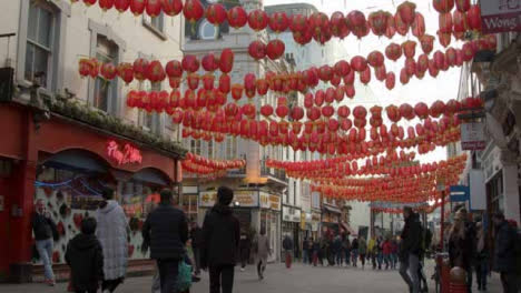 Fußgänger-Zu-Fuß-In-Chinatown-In-London,-Verschwommen