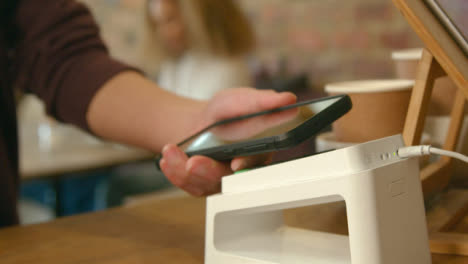 Close-Up-of-Contactless-Phone-Payment-03