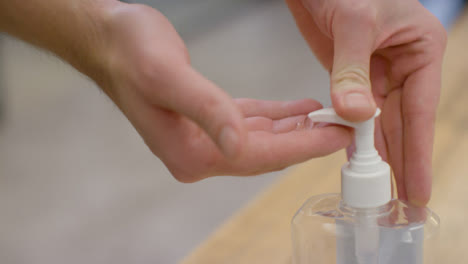 Close-up-Cleaning-Hands-Using-Hand-Sanitiser
