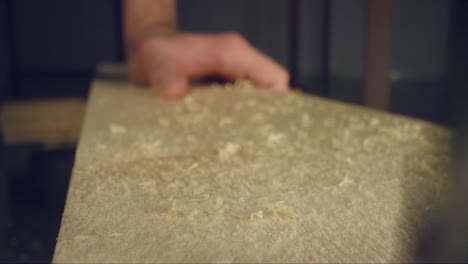 Boring-Wood-and-Brushing-Sawdust