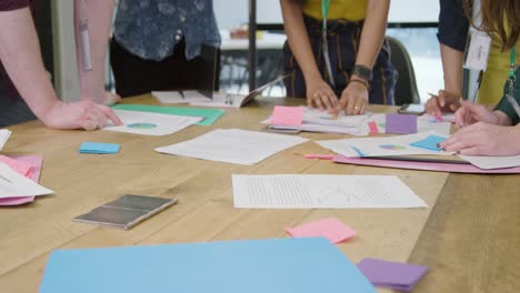 Close-up-of-table-during-meeting-of-colleagues