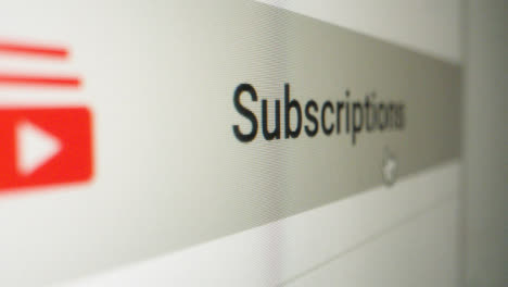 Close-Up-Clicking-on-Youtube-Subscriptions-button-on-Sidebar