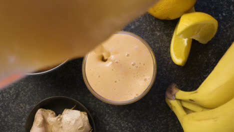 Overhead-Pouring-Healthy-Smoothie-in-Glass