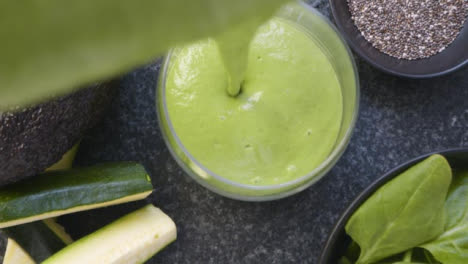 Overhead-Pouring-Green-Smoothie-into-Glass