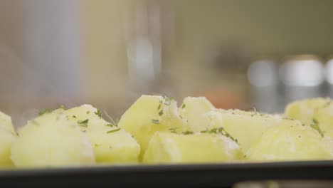 Close-Up-of-Hot-Potatoes-With-Herbs