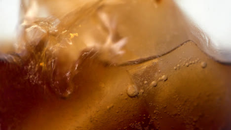Slow-Motion-Extreme-Close-Up-Soft-Drink-Pouring-In-Glass
