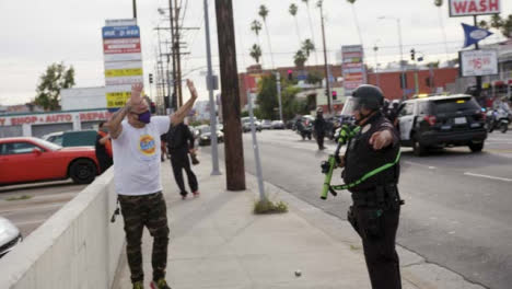 Hollywood-Police-Officer-Ushers-Protester-to-Move-During-Protest