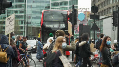 London-Anti-Racism-Protesters-Walking-by-Bus