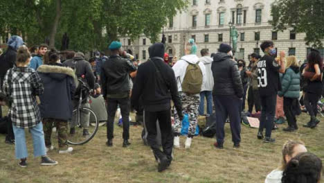 London-Male-Activist-Dancing-to-Música-in-Park