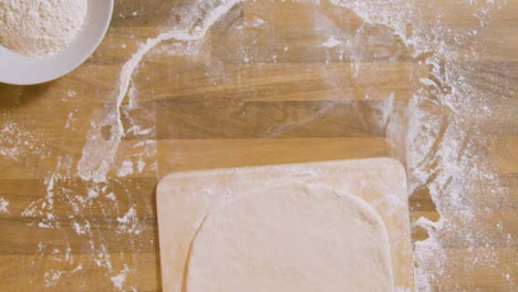 Top-View-Pizza-Dough-on-Pizza-Peel