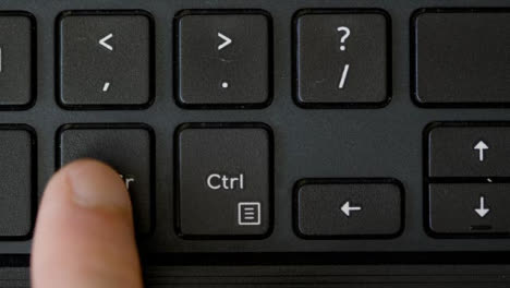 Top-View-Finger-Pressing-Alt-Gr-and-Ctrl-Keyboard-Buttons