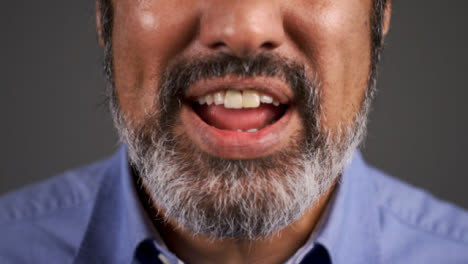 Close-Up-Angry-Middle-Aged-Man-Shouting-Portrait