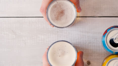 Top-View-Clinking-Glasses-of-Beer