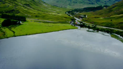 Sweeping-Aerial-Drone-Shot-of-Loch-Achtriochtan-in-Glen-Coe
